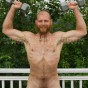 Ripped mountain man Bain strips naked jerking his big thick dick