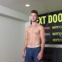 Sexy young dude Next Door Studios Elijah strips naked jerking his big cock