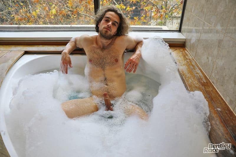 Young hairy hunk 21 year old Reece Anderson returns for a hot bath tub jerk off